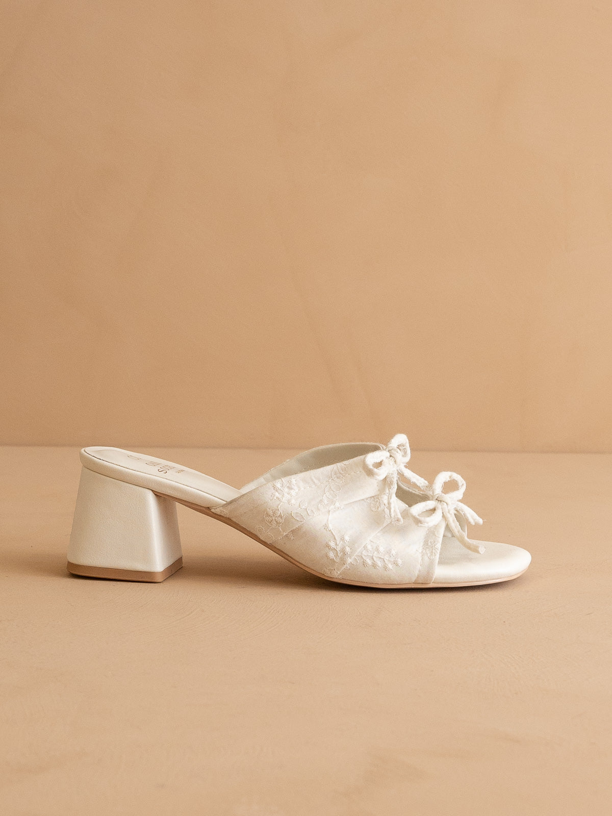 The Emerald | White Double Bow Peep Hole Block Heel – Oasis Society