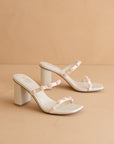 The Nia | White Rosette Adorned Block Heel