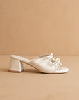 The Emerald | White Double Bow Peep Hole Block Heel