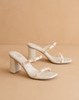 The Nia | White Rosette Adorned Heel